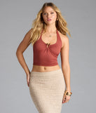With its midriff cut and trend-forward fit, the Feelin' The Heat Halter Crop Top is a rust crop top made to pair with skirts, denim, or whatever vibe you're feeling this season.