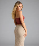With its midriff cut and trend-forward fit, the Feelin' The Heat Halter Crop Top is a rust crop top made to pair with skirts, denim, or whatever vibe you're feeling this season.