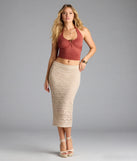 With its midriff cut and trend-forward fit, the Feelin' The Heat Halter Crop Top is a rust crop top made to pair with skirts, denim, or whatever vibe you're feeling this season.