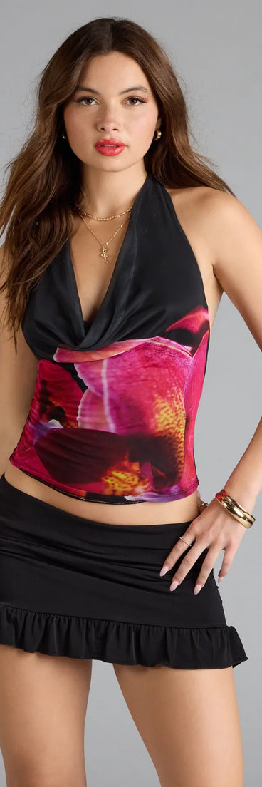 With its midriff cut and trend-forward fit, the Tropical Lifestyle Floral Halter Mesh Crop Top is a black crop top made to pair with skirts, denim, or whatever vibe you're feeling this season.