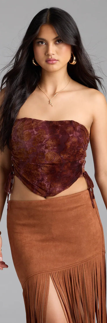 Complete your look with the Romantic Nights Lace-Up Paisley Corset Top, a trendy brown top that’s ready to pair with anything in your fall rotation.