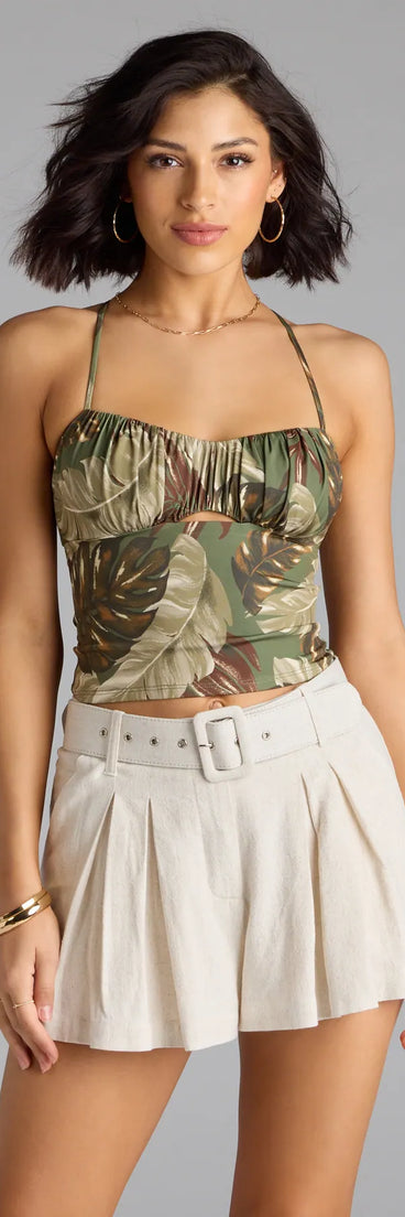With its midriff cut and trend-forward fit, the Out Of Office Lace-Up Tropical Crop Top is a olive green crop top made to pair with skirts, denim, or whatever vibe you're feeling this season.