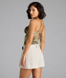 With its midriff cut and trend-forward fit, the Out Of Office Lace-Up Tropical Crop Top is a olive green crop top made to pair with skirts, denim, or whatever vibe you're feeling this season.