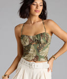 With its midriff cut and trend-forward fit, the Out Of Office Lace-Up Tropical Crop Top is a olive green crop top made to pair with skirts, denim, or whatever vibe you're feeling this season.