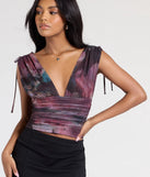 From bold to effortless, the Artful Impression Sleeveless Abstract Print Crop Top lets you define your vibe with multi-color tops that speak your style.