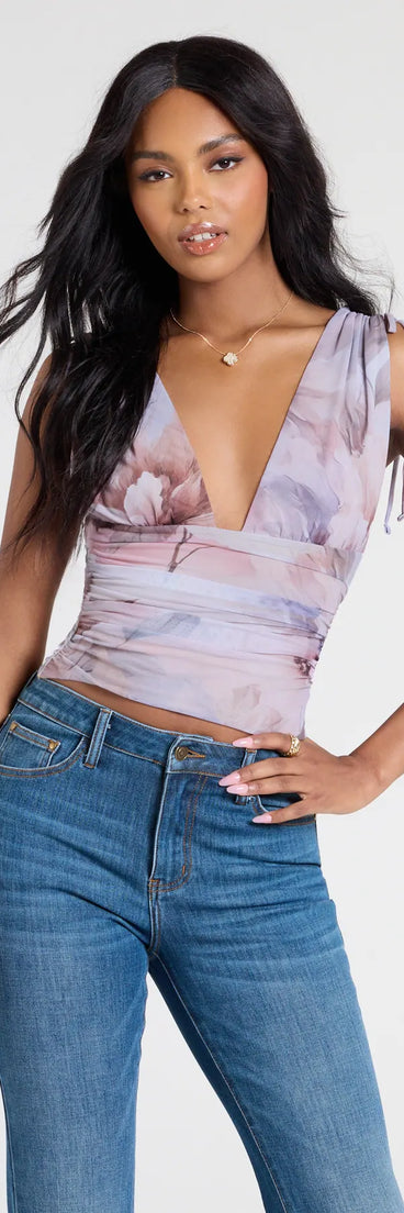 The Taking The Plunge Floral Mesh Crop Top in gray brings edge and energy to your vibe, ready to elevate any festival look or concert outfit.