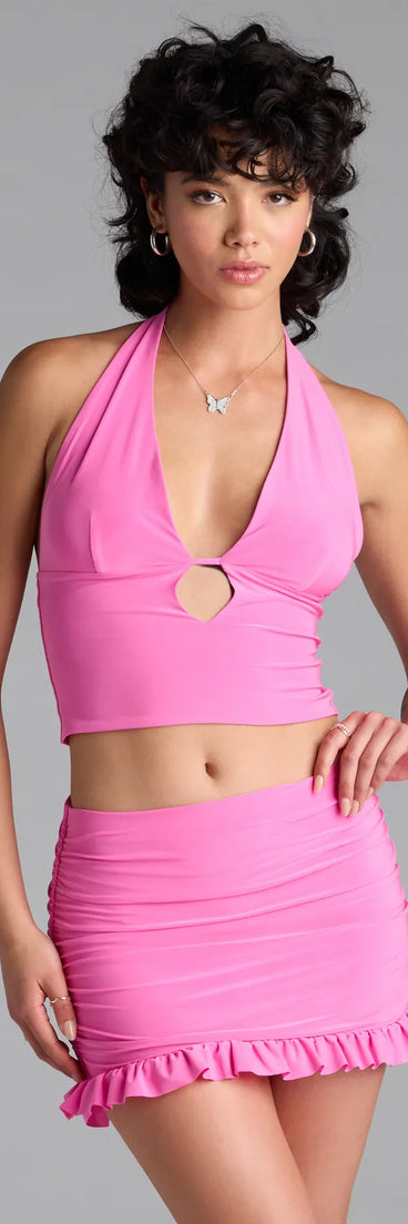 Serve effortless style and scroll-stopping energy in the Total Doll Halter Crop Top, part of a pink matching clothing set that does the work for you with bold, polished vibes from top to bottom.