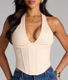 For college campus looks, game day outfits, or a bold going-out vibe, the Sleek And Stunning Corset Halter Top is an on-trend ivory crop top that easily styles with your favorite denim.