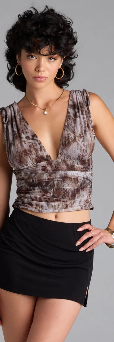 From bold to effortless, the Daring Beauty Animal Print Mesh Top lets you define your vibe with taupe tops that speak your style.