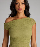 Complete your look with the Flirty Angles One-Shoulder Crop Top, a trendy sage green top that’s ready to pair with anything in your fall rotation.