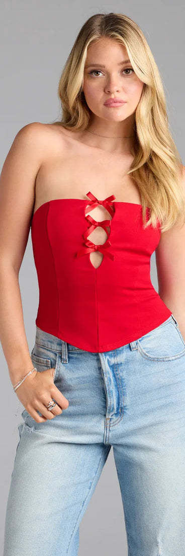 Complete your look with the Darling Strapless Bow Ponte Crop Top, a trendy red top that’s ready to pair with anything in your fall rotation.
