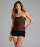 With its midriff cut and trend-forward fit, the Carefree And Cute Crop Tube Top is a brown crop top made to pair with skirts, denim, or whatever vibe you're feeling this season.