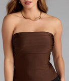 With its midriff cut and trend-forward fit, the Carefree And Cute Crop Tube Top is a brown crop top made to pair with skirts, denim, or whatever vibe you're feeling this season.
