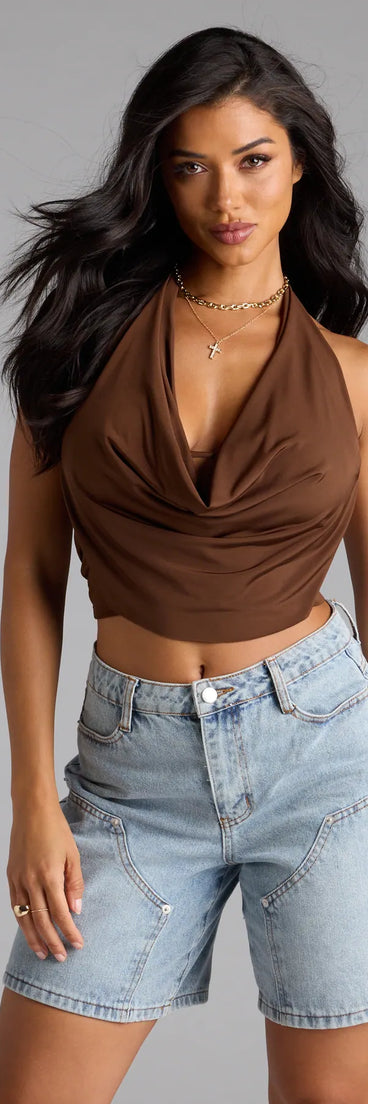 With its midriff cut and trend-forward fit, the Take The Plunge Sleeveless Halter Crop Top is a brown crop top made to pair with skirts, denim, or whatever vibe you're feeling this season.