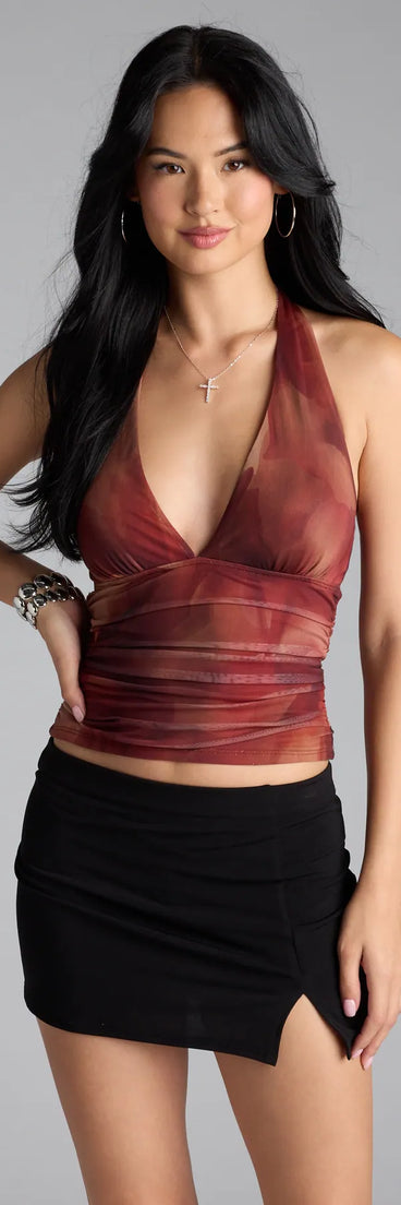 For college campus looks, game day outfits, or a bold going-out vibe, the In My Dreams Plunge Halter Abstract Crop Top is an on-trend rust crop top that easily styles with your favorite denim.
