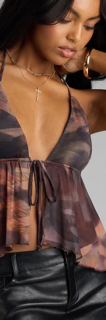 Complete your look with the Spill The Secrets Abstract Print Halter Top, a trendy brown top that’s ready to pair with anything in your fall rotation.