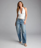 For college campus looks, game day outfits, or a bold going-out vibe, the Serving Vibes Halter Crop Top is an on-trend ivory crop top that easily styles with your favorite denim.