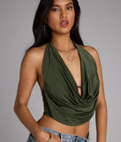For college campus looks, game day outfits, or a bold going-out vibe, the Take The Plunge Sleeveless Halter Crop Top is an on-trend olive green crop top that easily styles with your favorite denim.