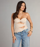 Complete your look with the Knot Your Average Tube Cutout Crop Top, a trendy top that’s ready to pair with anything in your fall rotation.