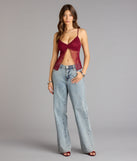 Trendy women’s tops, like the Delicate Dreams Lace Trim Floral Slit Crop Top, bring effortless style for fall layering, lounging, or going out.