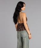 Trendy women’s tops, like the Spotted In Town Plunge Halter Top, bring effortless style for fall layering, lounging, or going out.