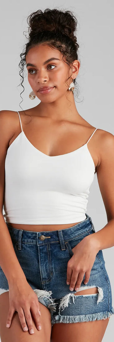 The Girl Next Door Cropped Tank in white with a modern design and trendy look is part of the latest women's tops collection to elevate your 2025 wardrobe.