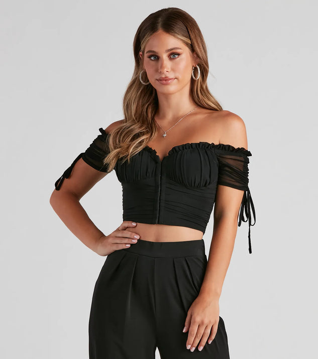 The Hooked In Ruched Crop Top in black with a modern design and trendy look is part of the latest women's tops collection to elevate your 2025 wardrobe.