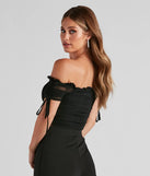 The Hooked In Ruched Crop Top in black is a women's workwear piece offering a trendy style and unique accents, perfect for effortlessly creating an outfit-of-the-day look that transitions your office look to going-out ready.