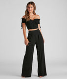 Stay on-trend this season with the Hooked In Ruched Crop Top in black, a must-have for creating stylish and effortless spring outfits for women.