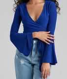Wrapped In Chic Bell Sleeve Top