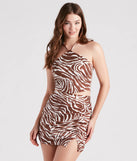 Effortlessly create holiday party outfits or vacation-ready looks with the Wild Style Zebra Print Crop Top, one part of a versatile women's brown matching set perfect for quick and easy outfit combinations from layering chic outfits to transitioning your look seamlessly.