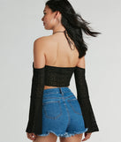 Make a statement this winter with the Getaway Attitude Off-The-Shoulder Crochet Top, a black long-sleeve top featuring a trendy shoulder design that adds a bold, festive touch to any holiday or party look.