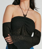 Make a statement this winter with the Getaway Attitude Off-The-Shoulder Crochet Top, a black long-sleeve top featuring a trendy shoulder design that adds a bold, festive touch to any holiday or party look.