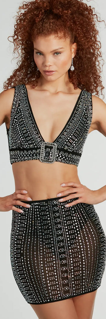 With fun and flirty details, the She's A Gem Plunge Neck Buckle Rhinestone Crop Top shows off your unique style for a trendy outfit for summer!