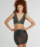 With fun and flirty details, the She's A Gem Plunge Neck Buckle Rhinestone Crop Top shows off your unique style for a trendy outfit for summer!
