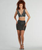 With fun and flirty details, the She's A Gem Plunge Neck Buckle Rhinestone Crop Top shows off your unique style for a trendy outfit for summer!
