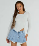 The Elevated Basic Long Sleeve Textured Top in ivory with a modern design and trendy look is part of the latest women's tops collection to elevate your 2025 wardrobe.
