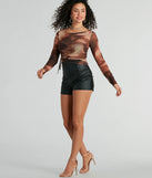 This women's brown long-sleeve top combines seasonal color with rich texture, offering a versatile style that's perfect for on-trend winter outfits.