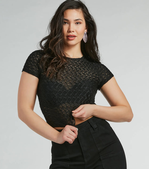 The Sultry Sheer Textured Knit Top in black with a modern design and trendy look is part of the latest women's tops collection to elevate your 2025 wardrobe.