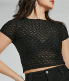 Stay on-trend this season with the Sultry Sheer Textured Knit Top in black, a must-have for creating stylish and effortless spring outfits for women.