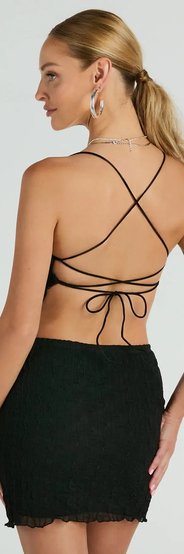 Perfect for creating a fashionable Valentine's Day outfit, the Feeling Daring Texture Knit Crop Top is a chic black top with romantic and modern flair, ideal for date night or Galentine’s celebrations.