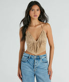 The Festive Icon V-Neck Fringe Halter Faux Suede Crop Top in beige with a modern design and trendy look is part of the latest women's tops collection to elevate your 2025 wardrobe.