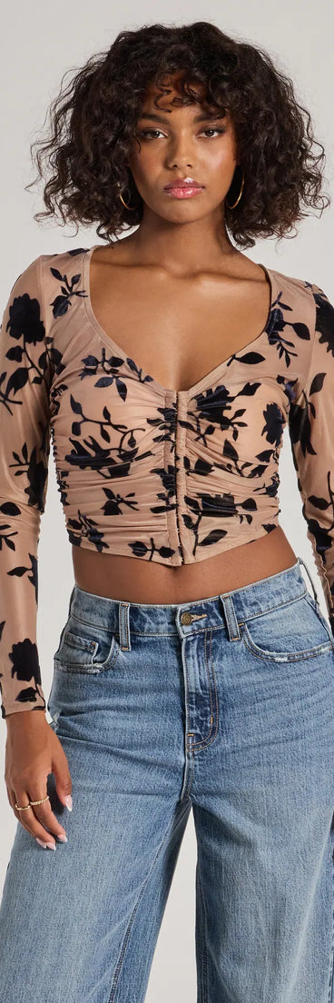 The Charming Flocked Floral Mesh Long Sleeve Corset Top in nude with a modern design and trendy look is part of the latest women's tops collection to elevate your 2025 wardrobe.