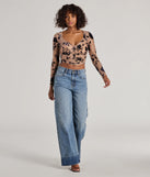 The party-ready Charming Flocked Floral Mesh Long Sleeve Corset Top is a nude going-out top showcasing a seasonal color and modern silhouette to create outfits for date nights, cocktail parties, or clubwear.