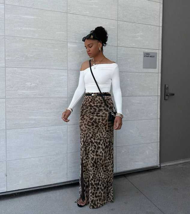 The Looking Flawless Smooth Off-The-Shoulder Top in white with a modern design and trendy look is part of the latest women's tops collection to elevate your 2025 wardrobe.