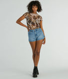 The Fierce Trendsetter Leopard Mesh Crop Top in leopard print with a modern design and trendy look is part of the latest women's tops collection to elevate your 2025 wardrobe.