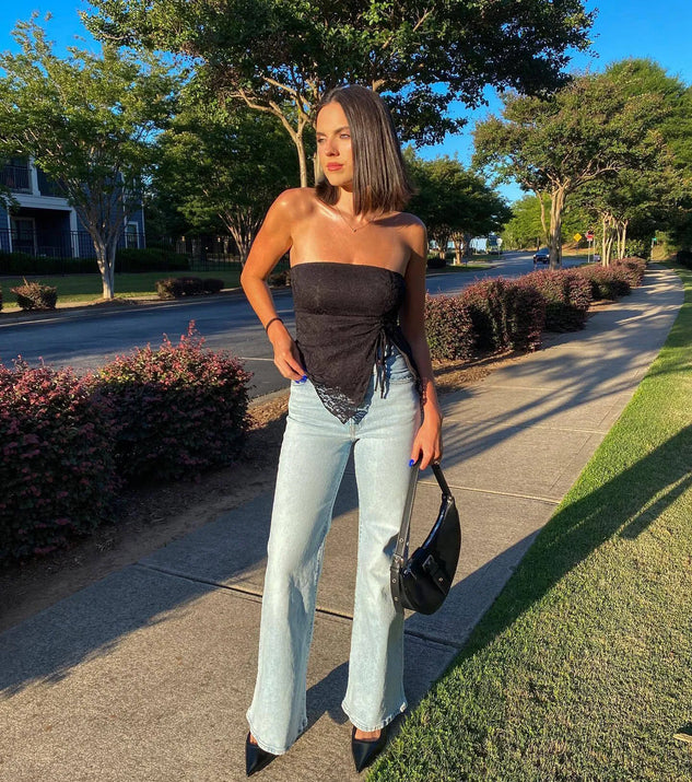 The Sheer Charm Strapless Lace Crop Top in black with a modern design and trendy look is part of the latest women's tops collection to elevate your 2025 wardrobe.