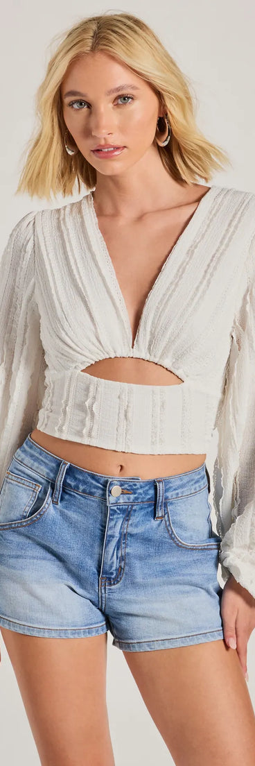 The Romance Awaits Long Sleeve Ruffle Lace Trim Crop Top in ivory with a modern design and trendy look is part of the latest women's tops collection to elevate your 2025 wardrobe.