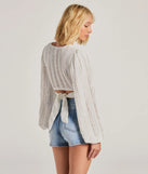 Stand out in 2025 in the Romance Awaits Long Sleeve Ruffle Lace Trim Crop Top, a women's ivory long-sleeve top crafted from an elevated fabric with a modern neckline perfect for party outfits, bridal shower attire, or elevated casual outfits.