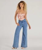 The waist-defining bodice style of the Pretty It Girl Lace-Up Floral Bustier in mauve is perfect for making a statement with your outfit and provides the structure, molded cups, or lace-up details that capture the corset trend.